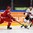 HELSINKI, FINLAND - JANUARY 2: Switzerland's Julien Privet #11 stickhandles the puck with pressure from Belarus' Ilya Bobko #18 and Danila Karaban #22 during relegation round action at the 2016 IIHF World Junior Championship. (Photo by Matt Zambonin/HHOF-IIHF Images)

